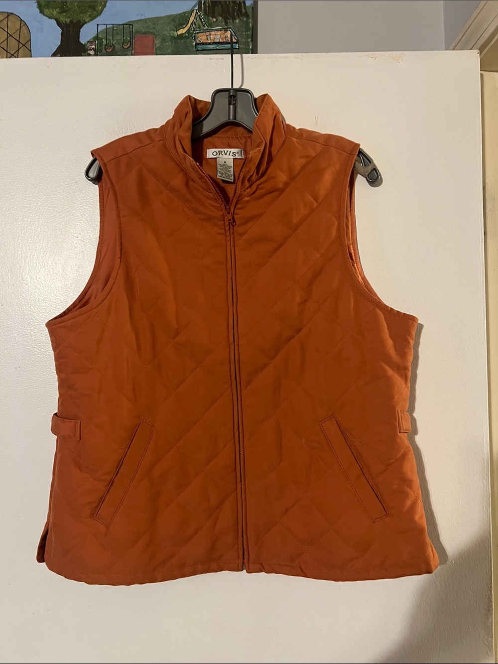 Orvis quilted zip front vest front pockets. Burnt orange